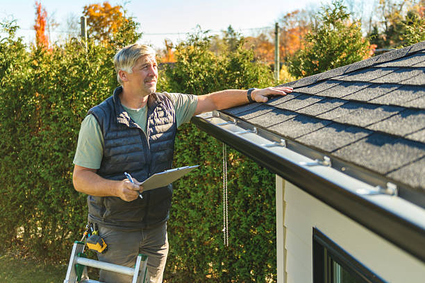 Professional Roofing technician working in Burt, MI